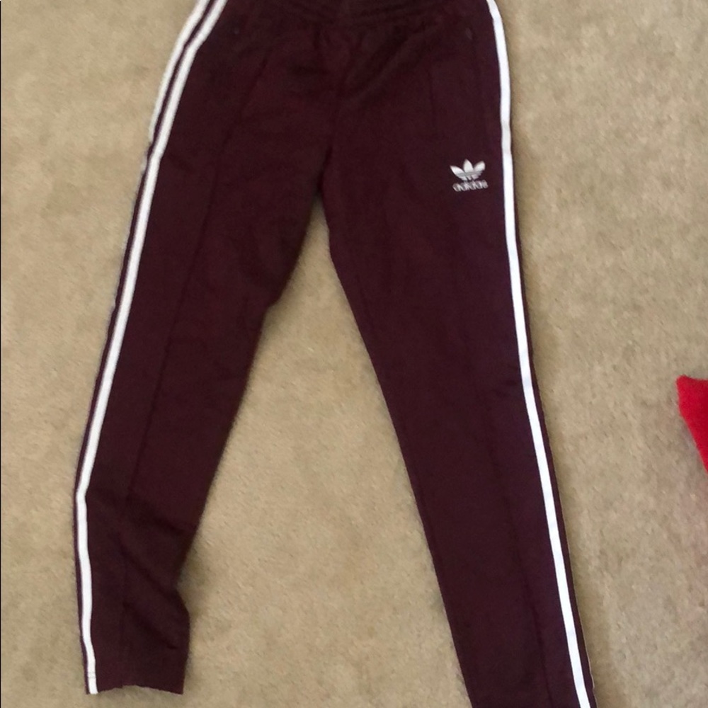Adidas women’s track pants.